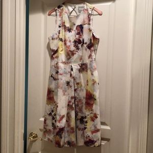Geometric floral design diamond cut back dress.